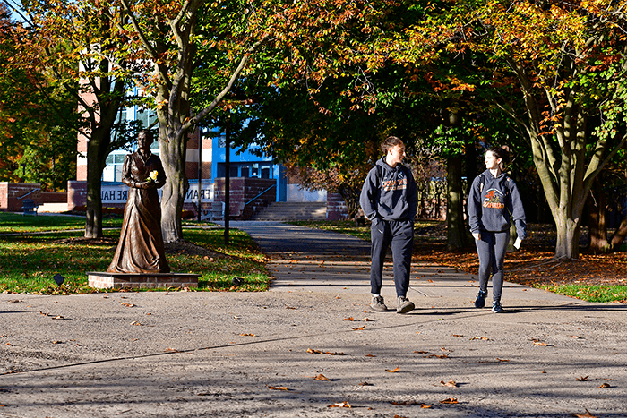 GMercyU students walking on campus